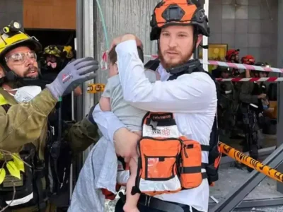 ‘My boy is OK!’: Infant found in rubble after missile barrage