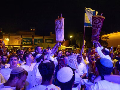 Simchat Torah in Hostages Square lays bare divide over just how much to celebrate yet